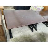 A PUB TABLE ON CAST IRON BASE, 42x27"