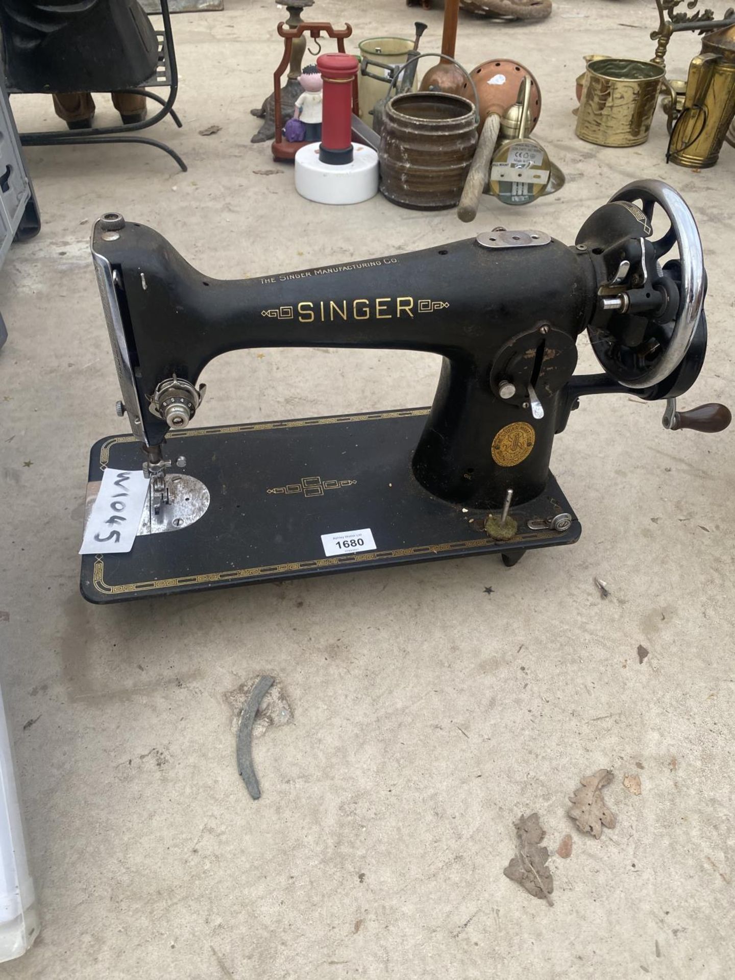 A VINTAGE SINGER SEWING MACHINE