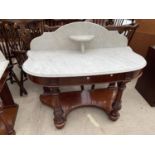 A VICTORIAN MAHOGANY WASHSTAND WITH MARBLE TOP AND BACK, WITH OPEN BASE ON TURNED AND FLUTED FRONT