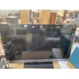 A SONY 40" TELEVISION WITH REMOTE CONTROL BELIEVED IN WORKING ORDER BUT NO WARRANTY