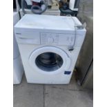 A WHITE BEKO WASHING MACHINE BELIEVED WORKING BUT NO WARRANTY