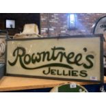 AN ILLUMINATED 'ROWNTREES'S JELLIES'' SIGN