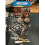 A VINTAGE BISCUIT TIN AND A QUANTITY OF FLATWARE
