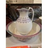 A WASH BOWL AND JUG