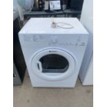 A WHITE HOTPOINT TUMBLE DRYER BELIEVED WORKING BUT NO WARRANTY