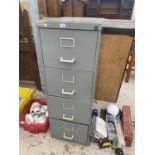 A METAL FOUR DRAWER FILING CABINET