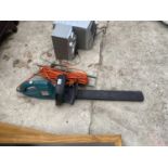 A MAKITA ELECTRIC HEDGE CUTTER