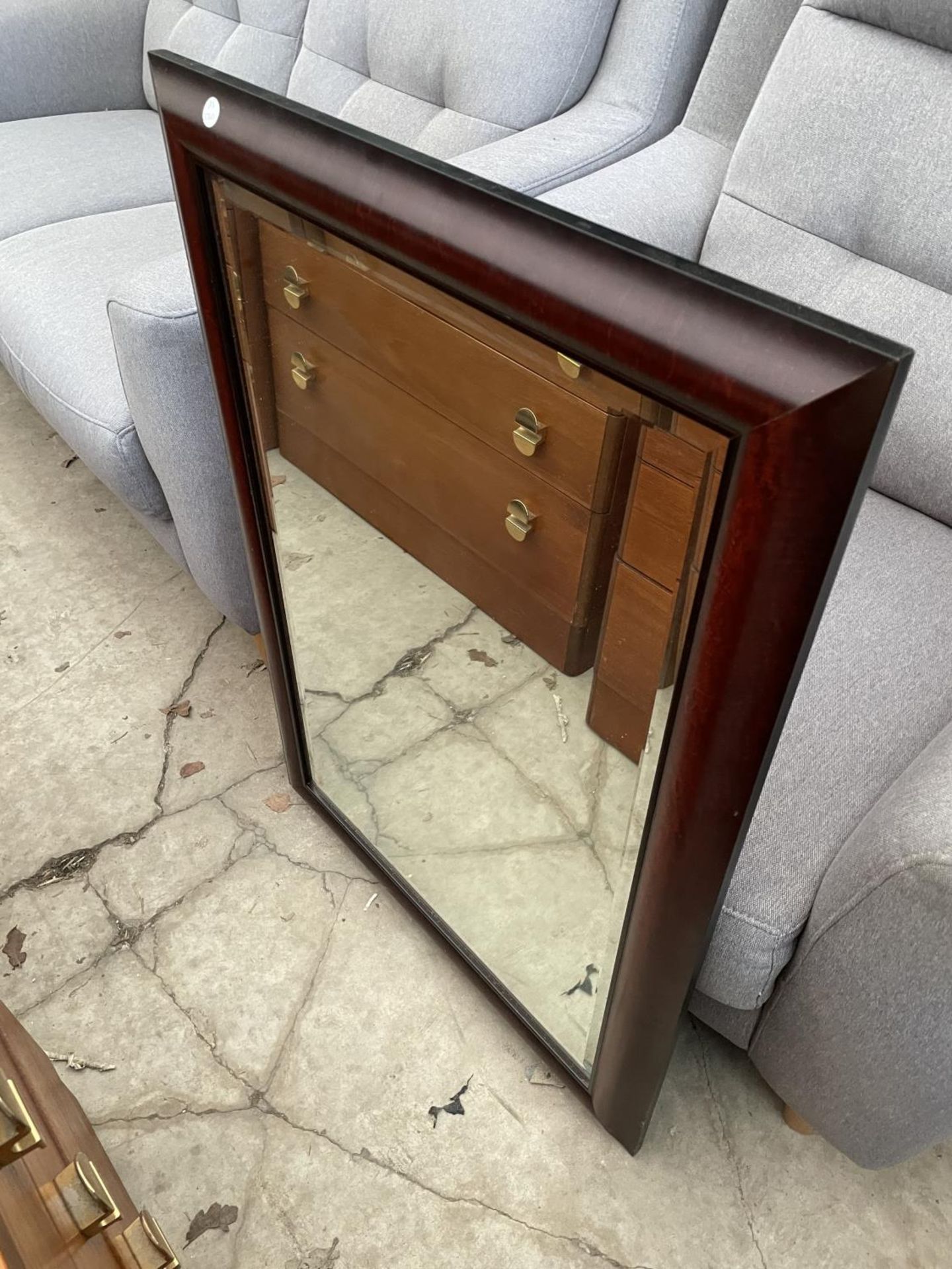 A MODERN TWO SEATER SETTEE, EASY CHAIR, POUFFE AND A MAHOGANY FRAMED MIRROR - Image 5 of 5