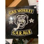 A METAL 'GAS MONKEY' SQUARE SIGN 30 CM X 30 CM