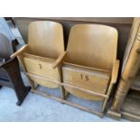A PAIR OF BEECH THEATRE/ CINEMA SEATS WITH BENT WOOD BACKS, NUMBERED 3 AND 15