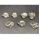 SEVEN WHITE METAL SKULL RINGS