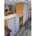 A COLLECTION OF RANGE STONEHILL FURNITURE TO INCLUDE TWO WARDROBES, TWO BEDSIDE CHEST AND A