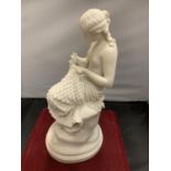 A PARIAN WARE FIGURE OF A GIRL MENDING A FISHING NET H- 33CM