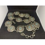 A WHITE METAL AND TURQUOISE NAVAJO STYLE BELT