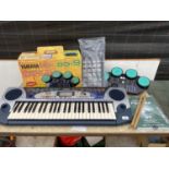 AN ASSORTMENT OF ITEMS TO INCLUDE A YAMAHA KEYBOARD, ELECTRIC DRUM KIT ETC