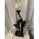 A SPELTER TABLE LAMP IN THE FORM OF A NUDE H:WITH GLASS SHADE 79CM