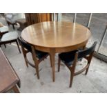 A RETRO TEAK CIRCULAR DINING TABLE 48" DIAMETER AND FOUR CLYDE DESIGN CHAIRS