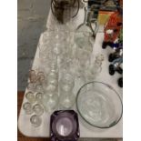 A LARGE QUANTITY OF GLASSWARE TO INCLUDE A BLOWN GLASS JUG ETC