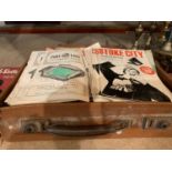 A SMALL VINTAGE SUITCASE CONTAINING A QUANTITY OF VINTAGE FOOTBALL PROGRAMMES PREDOMINANTLY PORT