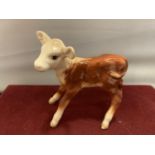 A BESWICK HEREFORD CALF