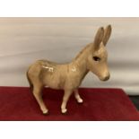 A BESWICK DONKEY FOAL