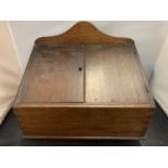 A VINTAGE WOODEN TWO DOOR DESK TOP STATIONARY BOX