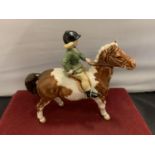 A BESWICK GIRL ON A PONY