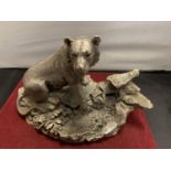 A COUNTRY ARTISTS SCULPTURE OF A LIONESS BY DAVID IVEY - 14CM HIGH 22CM LONG