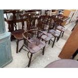 A SET OF EIGHT 18TH CENTURY STYLE ELM AND BEECH DINING CHAIRS WITH PIERCED SPLAT BACKS AND