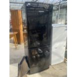 A BLACK DAEWOO FRIDGE FREEZER - BELIEVED WORKING BUT NO WARRANTY