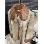 A FAUX FUR LADIES COAT