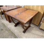 AN ART DECO DRAW-LEAF DINING TABLES