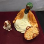 A ROYAL GRAFTON MIDDLE EASTERN MAN AND A BESWICK SPANIEL SIGNED