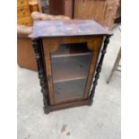 A VICTORIAN WALNUT PIER CABINET WITH EBONISED COLUMNS