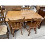 A MODERN PINE SINGLE DROP-LEAF KITCHEN TABLE AND FOUR CHAIRS