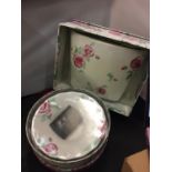 A ROYAL DOULTON ROSE CLOUDS LOW BOWL AND A VASE IN PRESENTATION BOXES