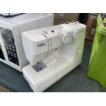 A JANOME SEWING MACHINE BELIEVED IN WORKING ORDER BUT NO WARRANTY