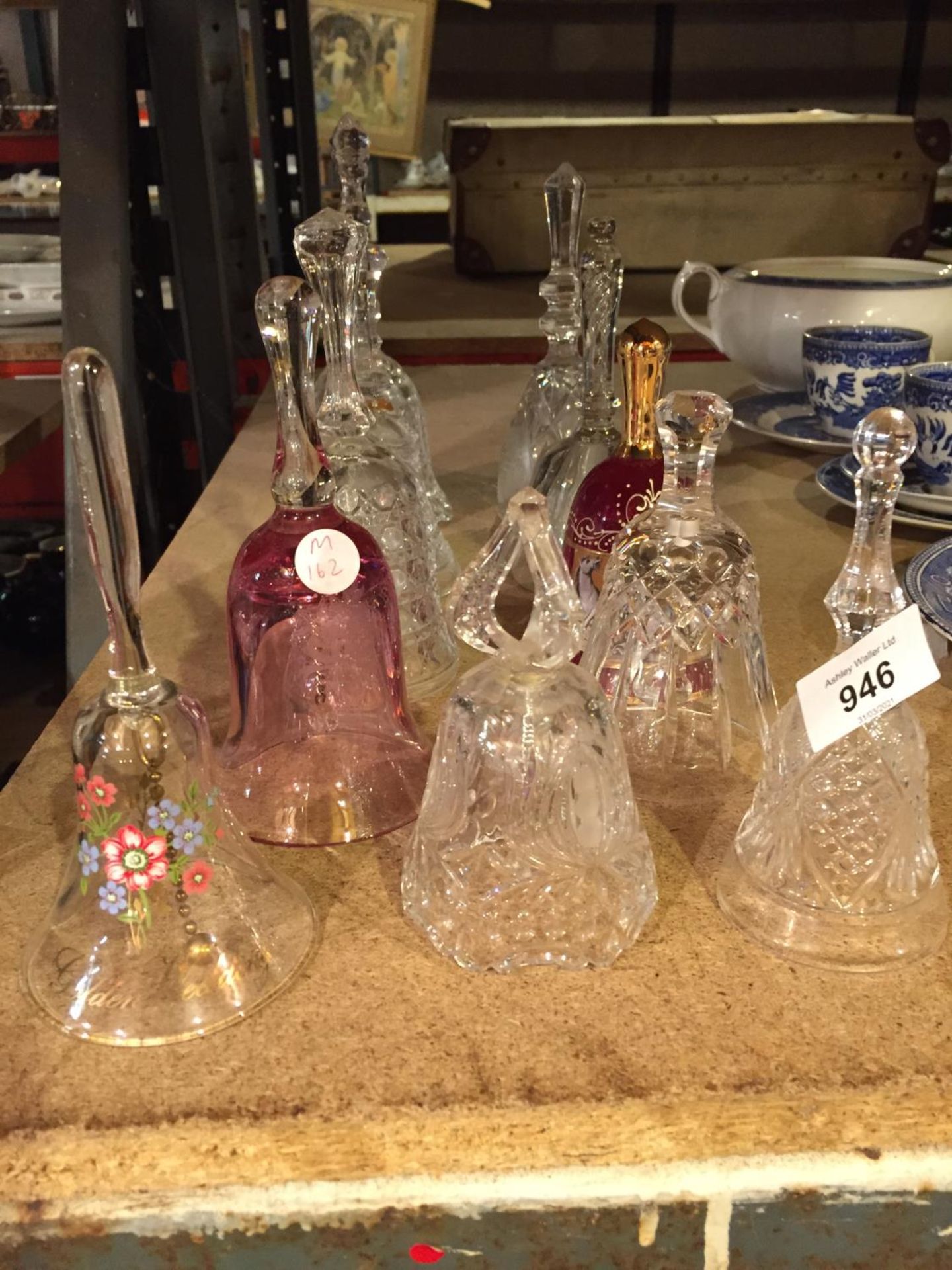 A COLLECTION OF GLASS BELLS
