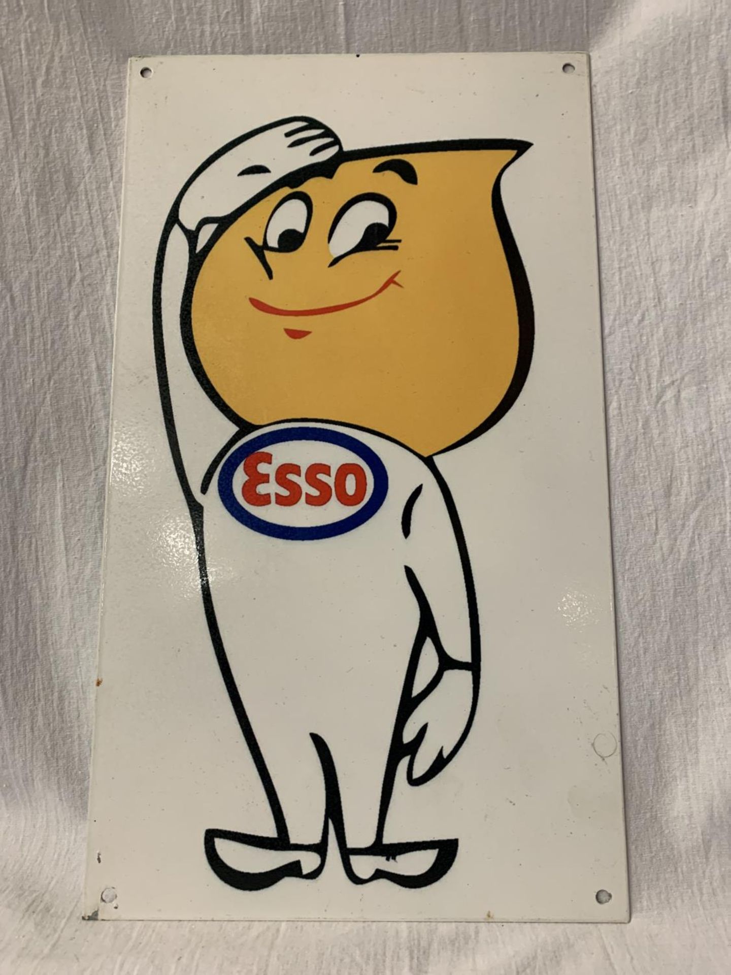 A METAL 'ESSO BOY' SIGN - 35.5CM X 20.5CM