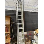 A PAIR OF TWO SECTION ALUMINIUM EXTENDING STEP LADDERS