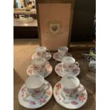 A SET OF SIX ABBEYDALE FLORAL DECORATED COFFEE CUPS AND SAUCERS WITH ORIGINAL BOX