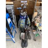 A SET OF GOLF CLUBS AND THREE PAIRS OF WELLINGTONS