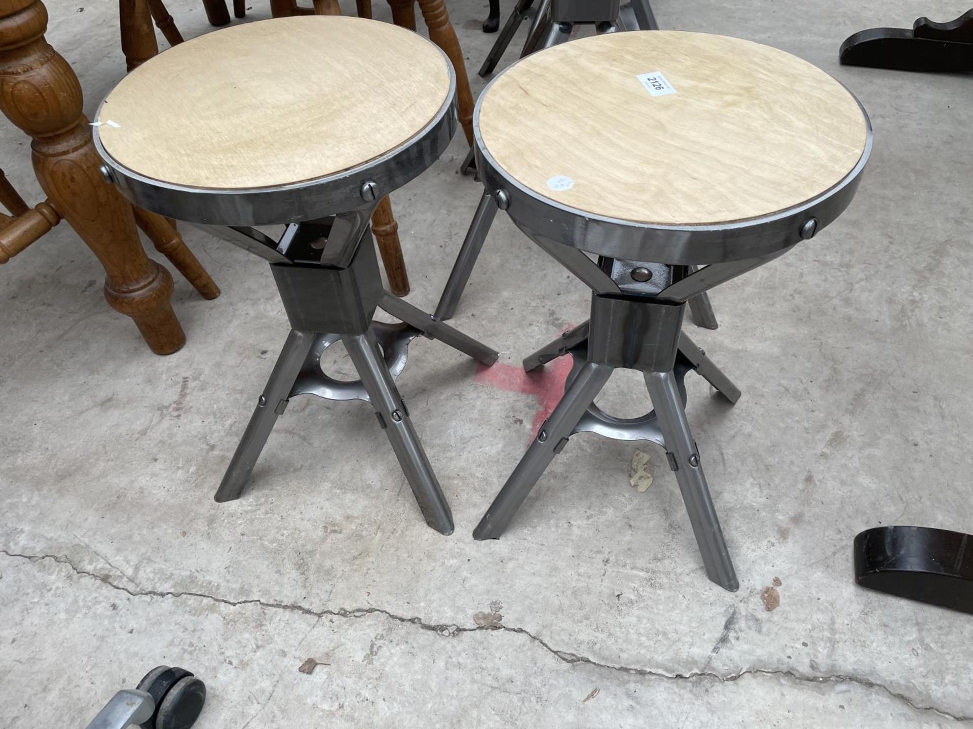 TWO LOW POLISHED METAL INDUSTRIAL STYLE STOOLS H: 18 INCHES