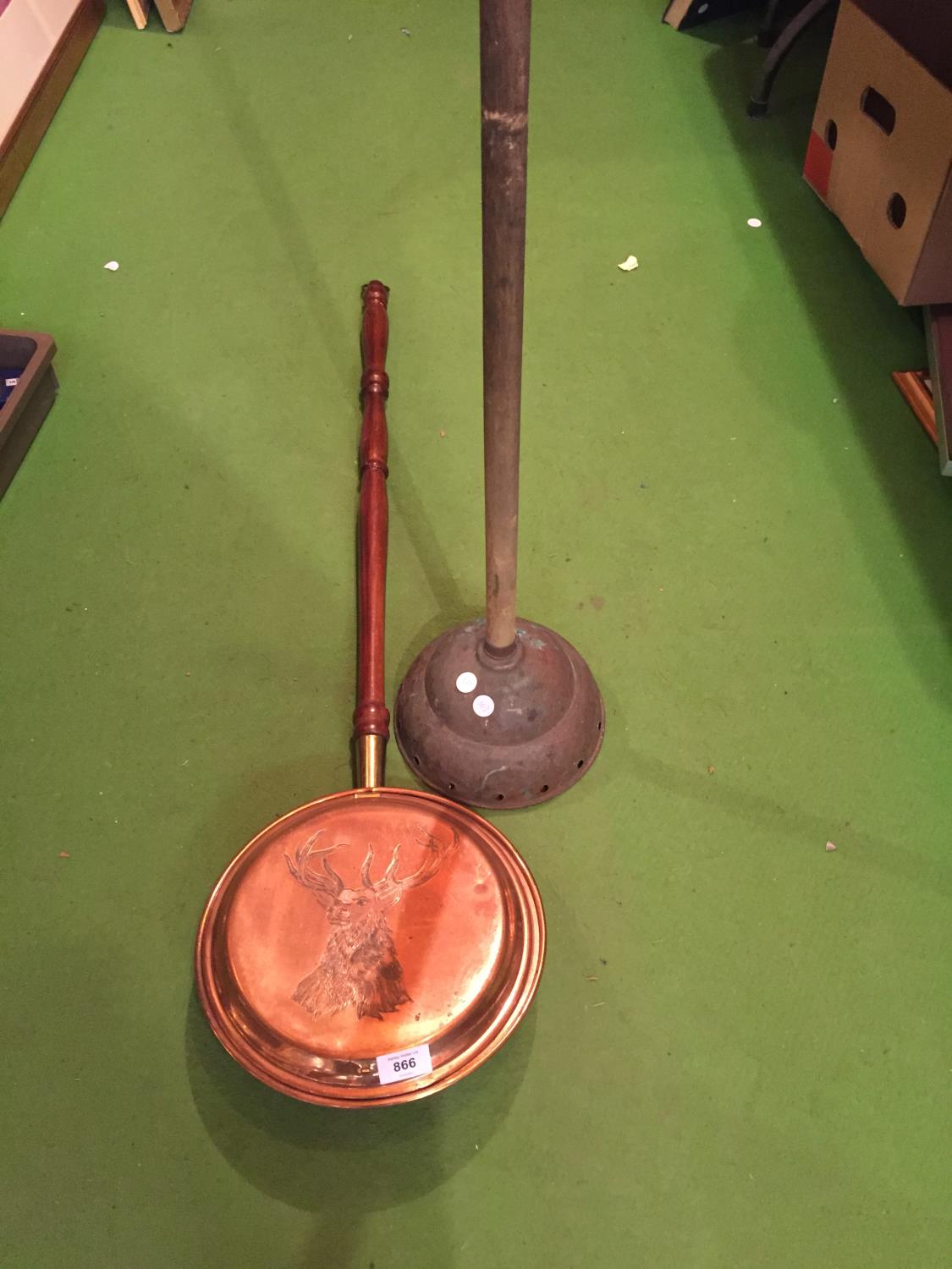 A VINTAGE SIMPLEX NO. 9 COPPER DOLLY POSSER AND A COPPER WARMING PAN WITH STAG DECORATION