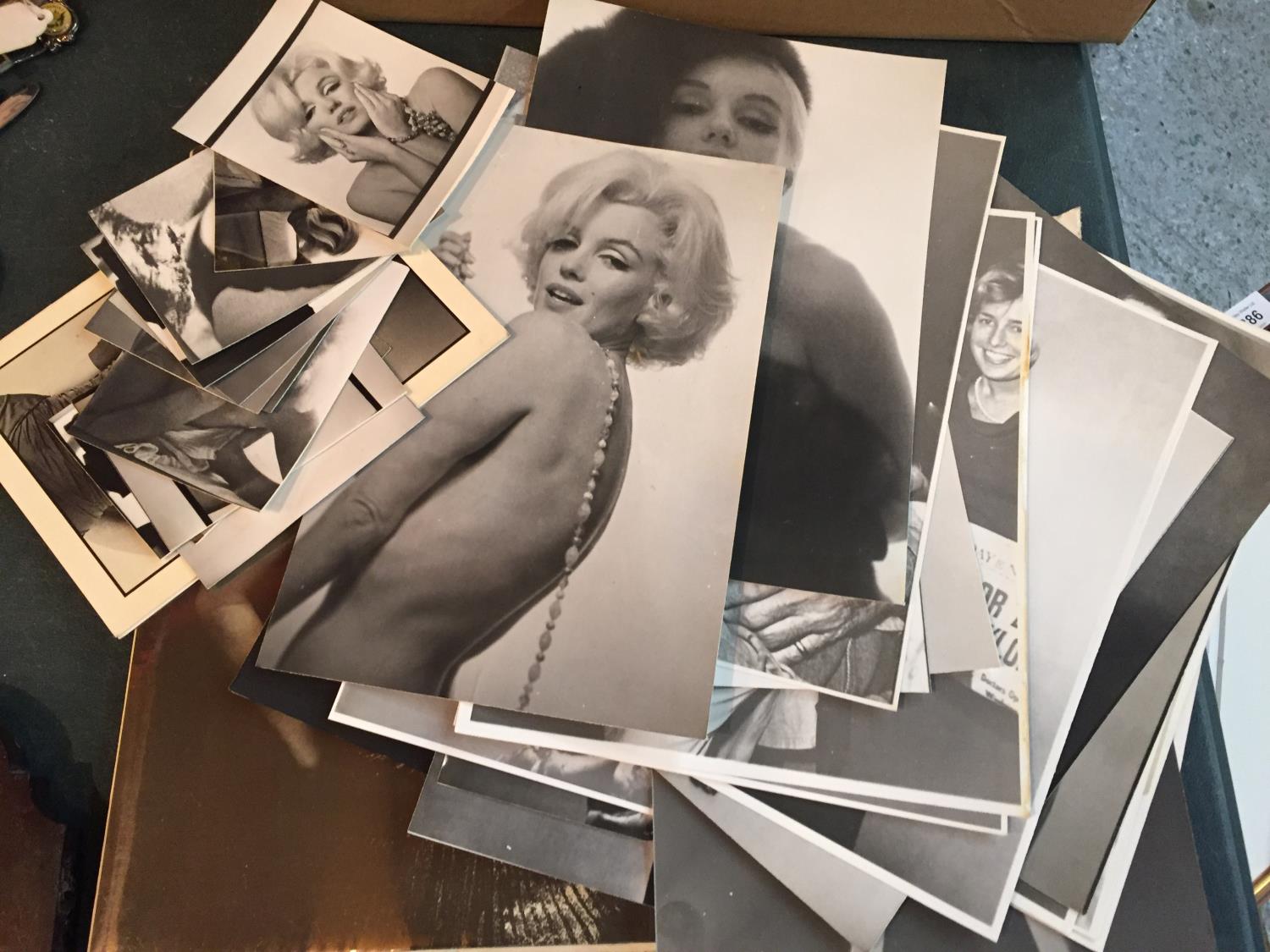 A QUANTITY OF BLACK AND WHITE PHOTGRAPHIC IMAGES OF MARILYN MONROE