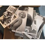 A QUANTITY OF BLACK AND WHITE PHOTGRAPHIC IMAGES OF MARILYN MONROE