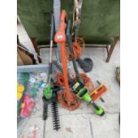 AN ASSORTMENT OF ELECTRIC GARDEN TOOLS TO INCLUDE STRIMMERS AND HEDGE CUTTERS ETC