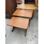 A NEST OF THREE RETRO TEAK TABLES BY 'VALCO'