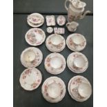 A ROYAL CROWN DERBY PART COFFEE SET DERBY POSIES CONSISTING OF SEVEN TRIOS, COFFEE POT, CREAM JUG,