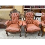 A PAIR OF VICTORIANS TYLE BUTTON-BACK EASY CHAIRS